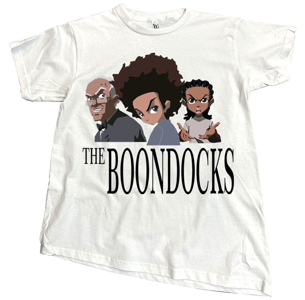 Streetwear enthusiast wearing a black graphic The BoonDocks tShirt in an urban setting