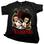 Streetwear enthusiast wearing a black graphic The BoonDocks tShirt in an urban setting