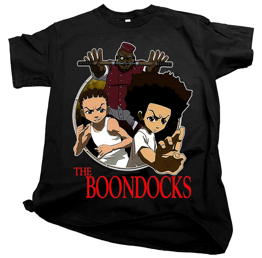 Streetwear enthusiast wearing a black graphic The BoonDocks tShirt in an urban setting